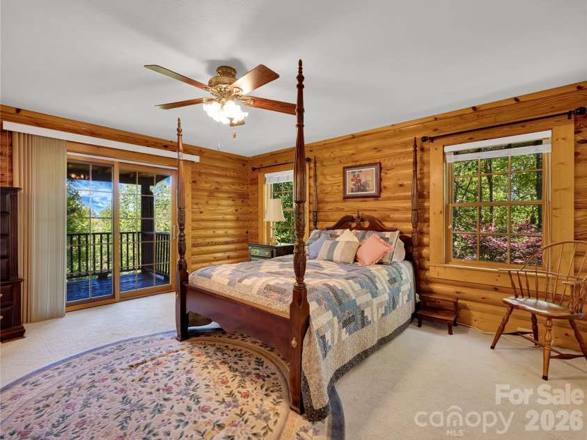 212 Glen Echo Circle, Saluda, NC 28773.  MLS# CAR4369603, YatesRealty ID 15139. Primary bedroom with beautiful views