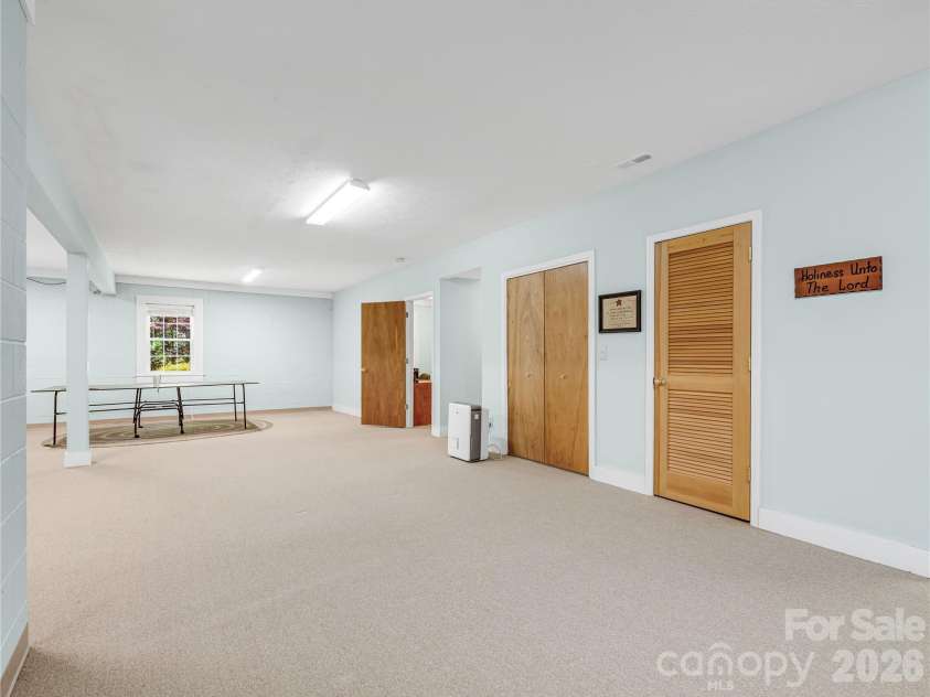 212 Glen Echo Circle, Saluda, NC 28773.  MLS# CAR4369603, YatesRealty ID 15139. So many possibilities with these nice high ceilings