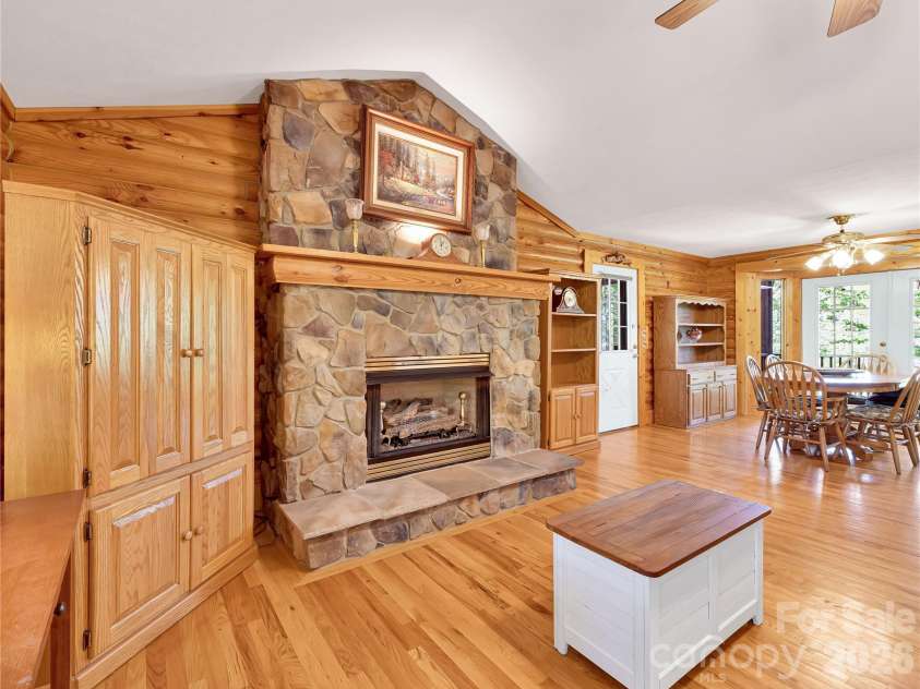 212 Glen Echo Circle, Saluda, NC 28773.  MLS# CAR4369603, YatesRealty ID 15139. Stone fireplace with gas logs