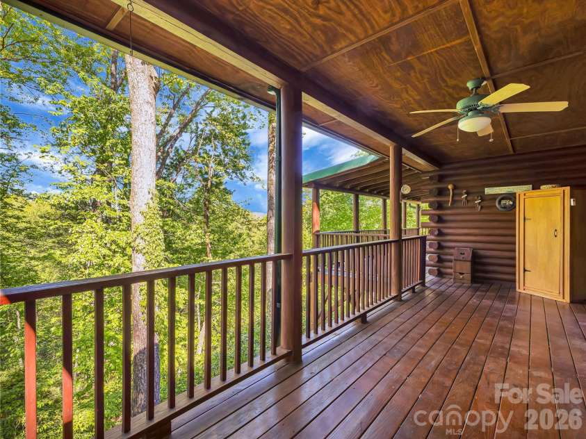 212 Glen Echo Circle, Saluda, NC 28773.  MLS# CAR4369603, YatesRealty ID 15139. Trees add privacy and help cool the home in summer