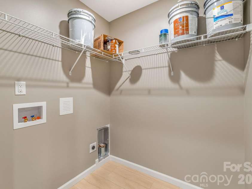 1196 Crabtree Road, Waynesville, NC 28785.  MLS# CAR4367690, YatesRealty ID 15143. Designated laundry room with storage