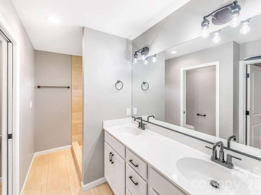 1196 Crabtree Road, Waynesville, NC 28785.  MLS# CAR4367690, YatesRealty ID 15143. Double vanities in primary