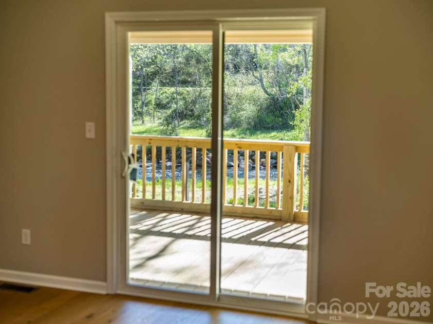 1196 Crabtree Road, Waynesville, NC 28785.  MLS# CAR4367690, YatesRealty ID 15143. Private back deck