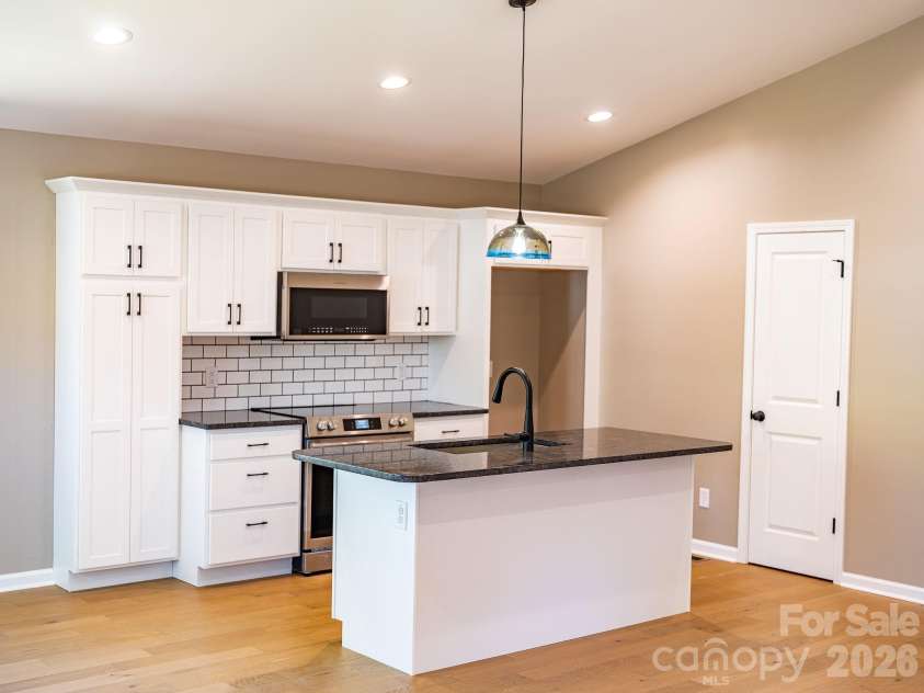 1196 Crabtree Road, Waynesville, NC 28785.  MLS# CAR4367690, YatesRealty ID 15143. Sweet kitchen space with island
