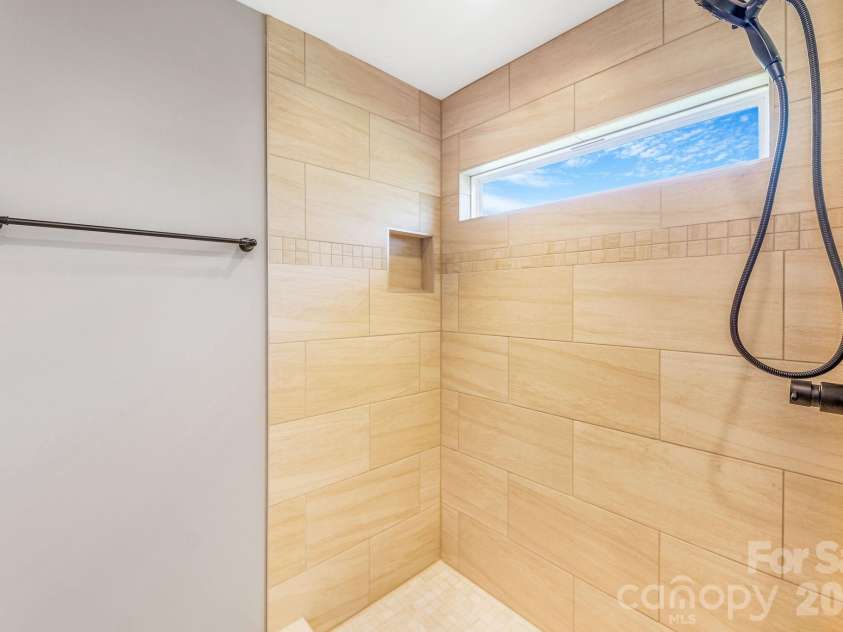 1196 Crabtree Road, Waynesville, NC 28785.  MLS# CAR4367690, YatesRealty ID 15143. Walk in tile shower