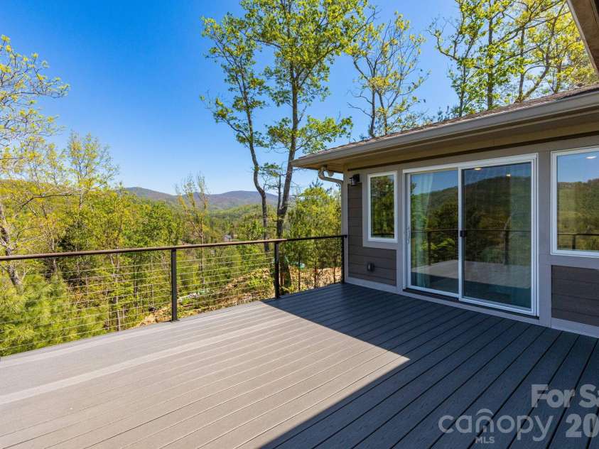 36 Spy Pointe Lane, Fletcher, NC 28732.  MLS# CAR4372672, YatesRealty ID 15149. Primary Suite Private Deck