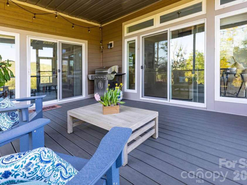 36 Spy Pointe Lane, Fletcher, NC 28732.  MLS# CAR4372672, YatesRealty ID 15149. Screened Porch