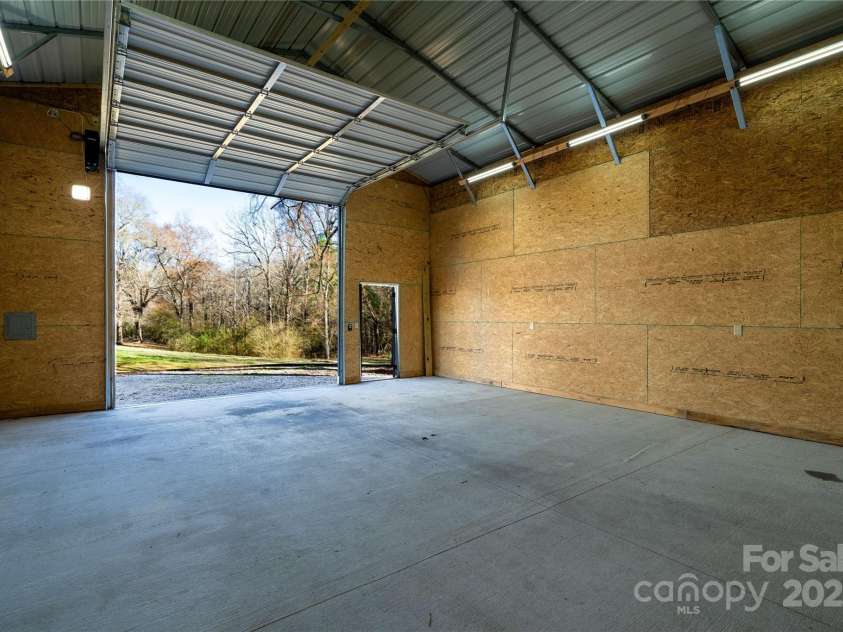 4428 Turkey Lane, Rock Hill, SC 29730.  MLS# CAR4219349, YatesRealty ID 1515. Inside of garage/workshop