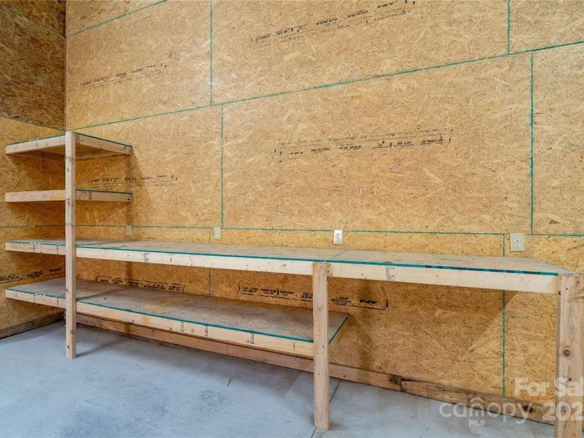 4428 Turkey Lane, Rock Hill, SC 29730.  MLS# CAR4219349, YatesRealty ID 1515. Shelves in garage/workshop