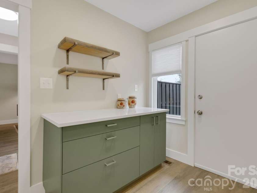 403 Crowfields Drive, Asheville, NC 28803.  MLS# CAR4348824, YatesRealty ID 15152. Additional workspace in kitchen