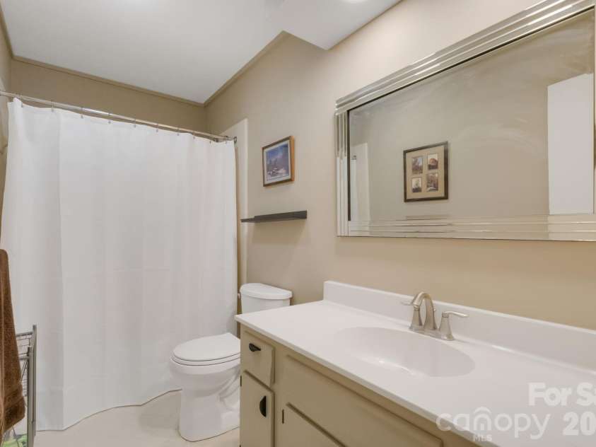 403 Crowfields Drive, Asheville, NC 28803.  MLS# CAR4348824, YatesRealty ID 15152. Hall full bath