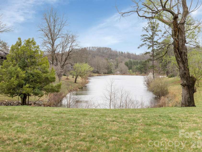 403 Crowfields Drive, Asheville, NC 28803.  MLS# CAR4348824, YatesRealty ID 15152. One of two beautifully maintained ponds