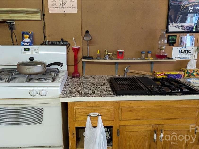 1115 Old Thompson Avenue, Lancaster, SC 29720.  MLS# CAR4249647, YatesRealty ID 15154. Kitchen in the workshop for entertaining