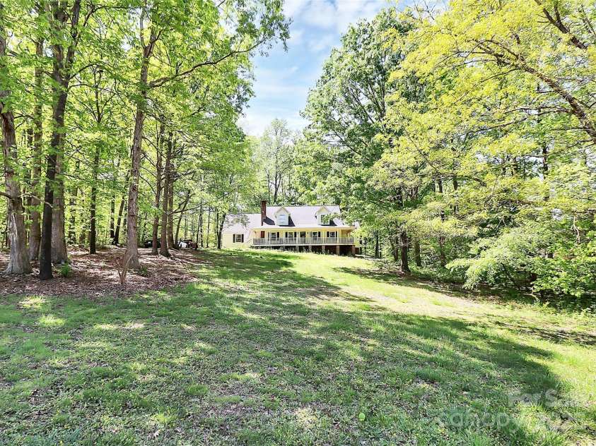 2780 China Grove Road, Kannapolis, NC 28083.  MLS# CAR4251597, YatesRealty ID 15157. Large front porch to enjoy nature