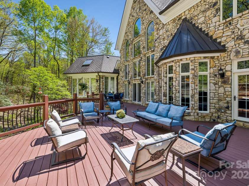 5712 Summit Road, Purlear, NC 28665.  MLS# CAR4141857, YatesRealty ID 1516. Back porch with hotub