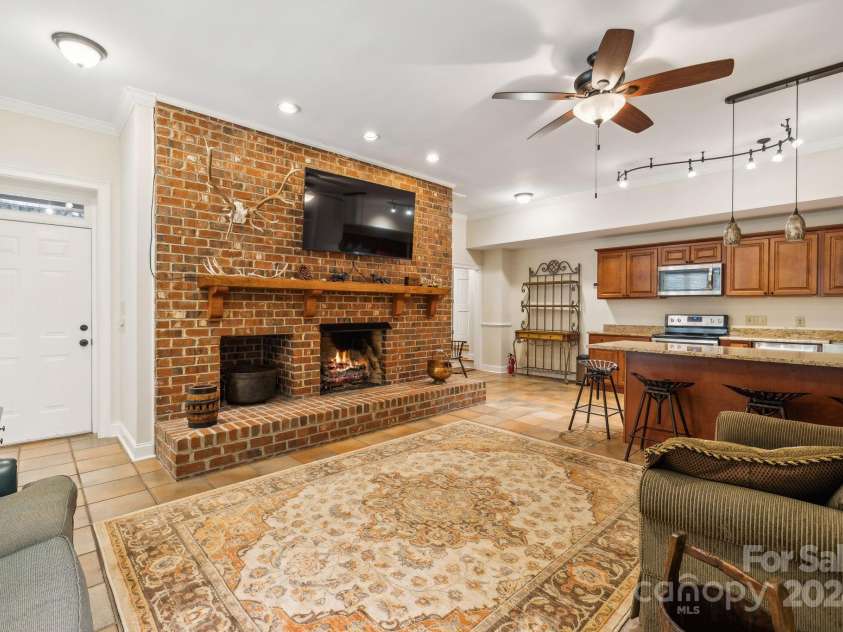 5712 Summit Road, Purlear, NC 28665.  MLS# CAR4141857, YatesRealty ID 1516. Basement Living Room