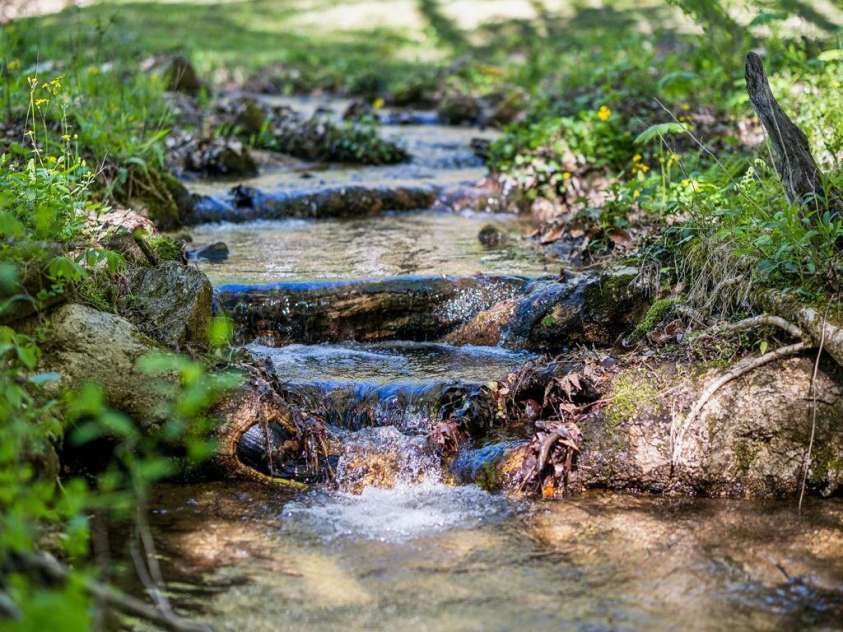 5712 Summit Road, Purlear, NC 28665.  MLS# CAR4141857, YatesRealty ID 1516. Spring fed creek