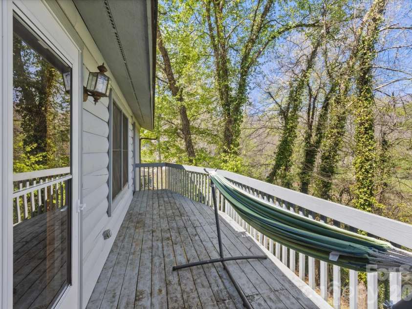 187 Cedarwood Drive, Waynesville, NC 28785.  MLS# CAR4368714, YatesRealty ID 15166. Back deck with winter view