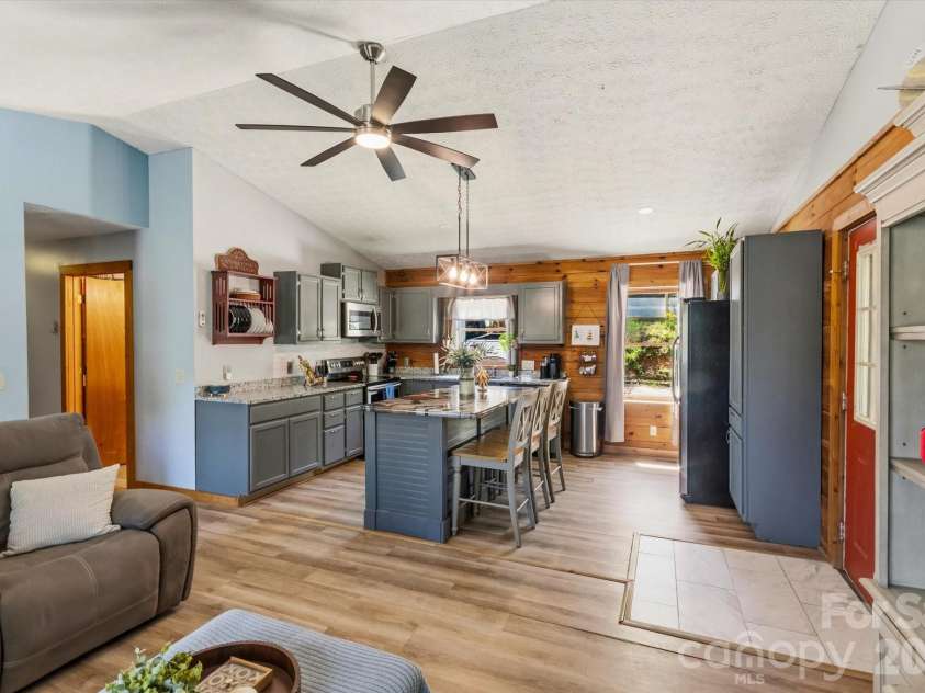 187 Cedarwood Drive, Waynesville, NC 28785.  MLS# CAR4368714, YatesRealty ID 15166. Kitchen from living room