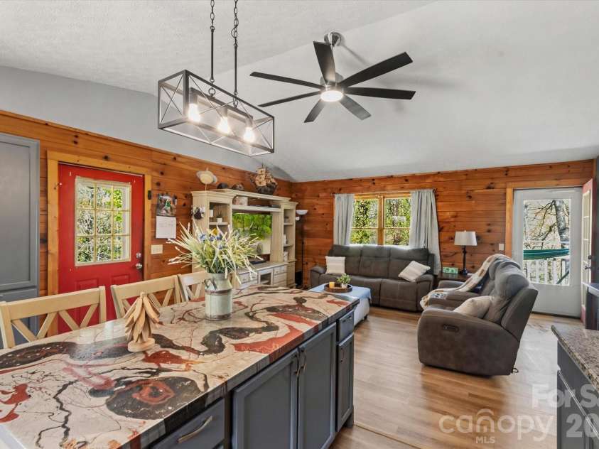 187 Cedarwood Drive, Waynesville, NC 28785.  MLS# CAR4368714, YatesRealty ID 15166. Living room from kitchen