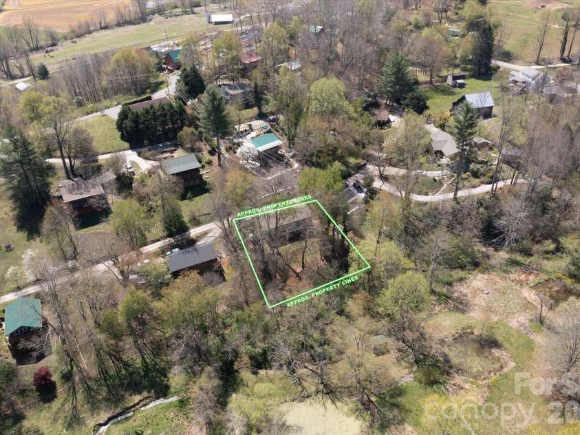187 Cedarwood Drive, Waynesville, NC 28785.  MLS# CAR4368714, YatesRealty ID 15166. Neighborhood from drone with approximate lot lines