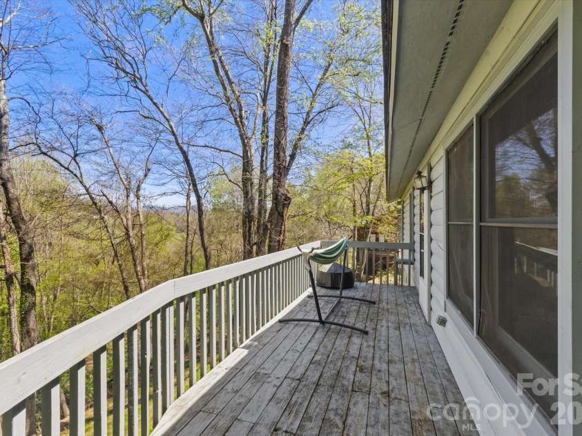 187 Cedarwood Drive, Waynesville, NC 28785.  MLS# CAR4368714, YatesRealty ID 15166. Outside back deck