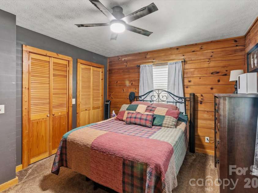 187 Cedarwood Drive, Waynesville, NC 28785.  MLS# CAR4368714, YatesRealty ID 15166. Primary bedroom