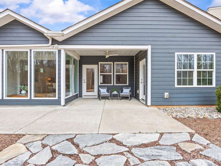 8122 Asher Chase Trail, Lancaster, SC 29720.  MLS# CAR4350544, YatesRealty ID 15169. The extended stone patio.