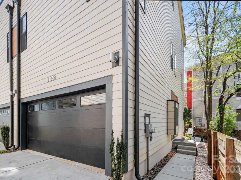 1115 Greenleaf Avenue, Charlotte, NC 28202.  MLS# CAR4248840, YatesRealty ID 15173. Garage and Front Entry View of 1115 b