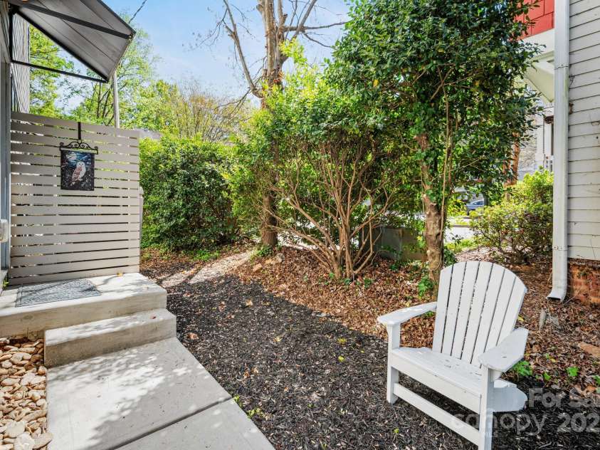 1115 Greenleaf Avenue, Charlotte, NC 28202.  MLS# CAR4248840, YatesRealty ID 15173. Rear Studio/Suite Entry with Outside Sitting Area