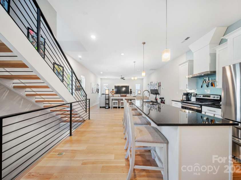 1115 Greenleaf Avenue, Charlotte, NC 28202.  MLS# CAR4248840, YatesRealty ID 15173. Upper Floor Living/Dining/Kitchen