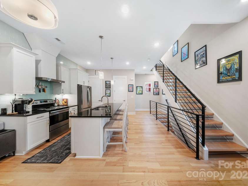 1115 Greenleaf Avenue, Charlotte, NC 28202.  MLS# CAR4248840, YatesRealty ID 15173. Upper Floor Living/Dining/Kitchen