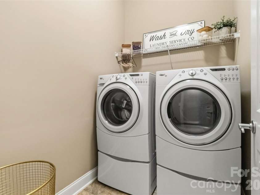 8213 Cottsbrooke Drive, Huntersville, NC 28078.  MLS# CAR4372828, YatesRealty ID 15173. Main floor laundry