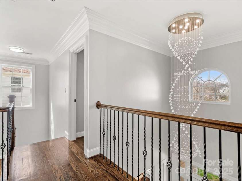 2100 Bluebonnet Lane, Matthews, NC 28104.  MLS# CAR4229213, YatesRealty ID 15179. 2 story Chandelier