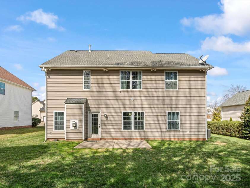 2100 Bluebonnet Lane, Matthews, NC 28104.  MLS# CAR4229213, YatesRealty ID 15179. Rear of house