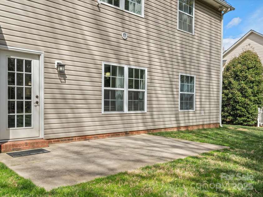 2100 Bluebonnet Lane, Matthews, NC 28104.  MLS# CAR4229213, YatesRealty ID 15179. Rear patio