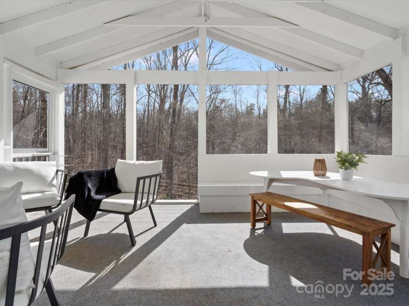 14723 Sapphire Lane, Pineville, NC 28134.  MLS# CAR4228552, YatesRealty ID 15180. Coffee on the screened in porch overlooking the peaceful back yard