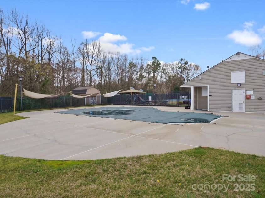 14723 Sapphire Lane, Pineville, NC 28134.  MLS# CAR4228552, YatesRealty ID 15180. Community Pool and Clubhouse