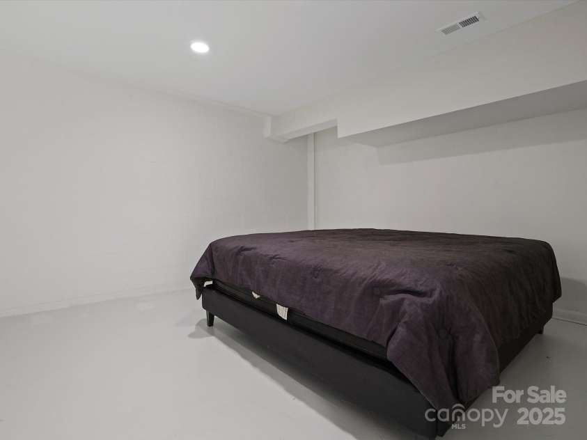 14723 Sapphire Lane, Pineville, NC 28134.  MLS# CAR4228552, YatesRealty ID 15180. Large flex room in the basement