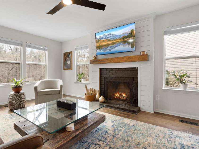 14723 Sapphire Lane, Pineville, NC 28134.  MLS# CAR4228552, YatesRealty ID 15180. New shiplap and mantle for the fireplace