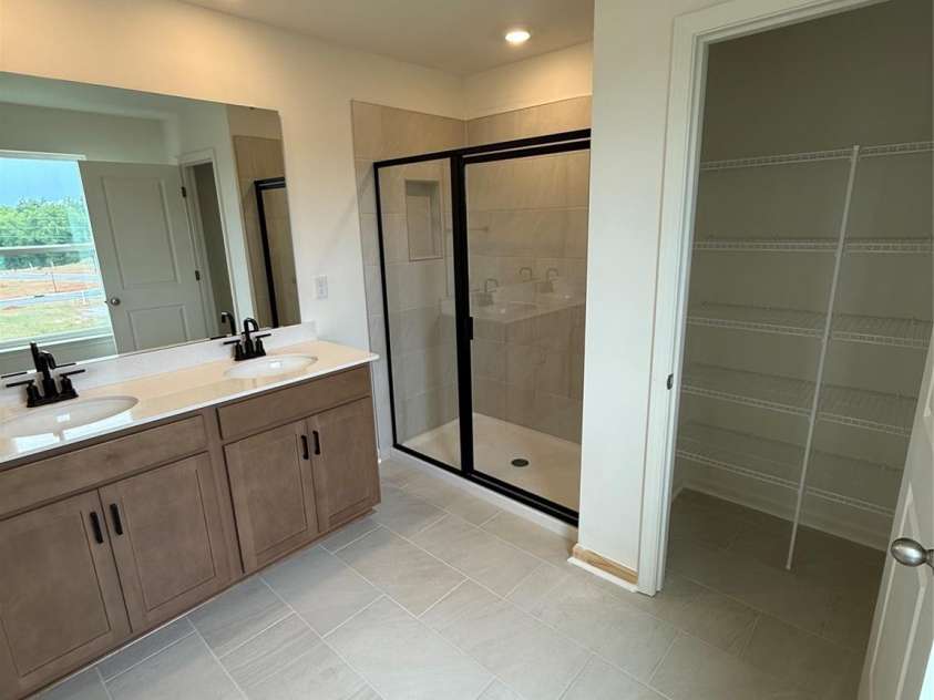 346 Knotty Wood Drive, Monroe, NC 28110.  MLS# CAR4237820, YatesRealty ID 15188. Primary bathroom