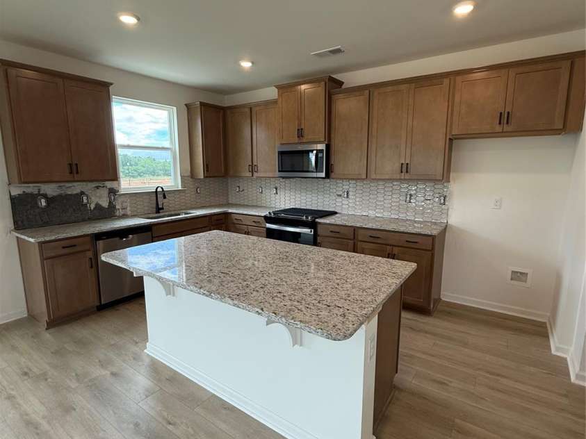346 Knotty Wood Drive, Monroe, NC 28110.  MLS# CAR4237820, YatesRealty ID 15188. Stunning modern farmhouse design scheme (backsplash still in progress)