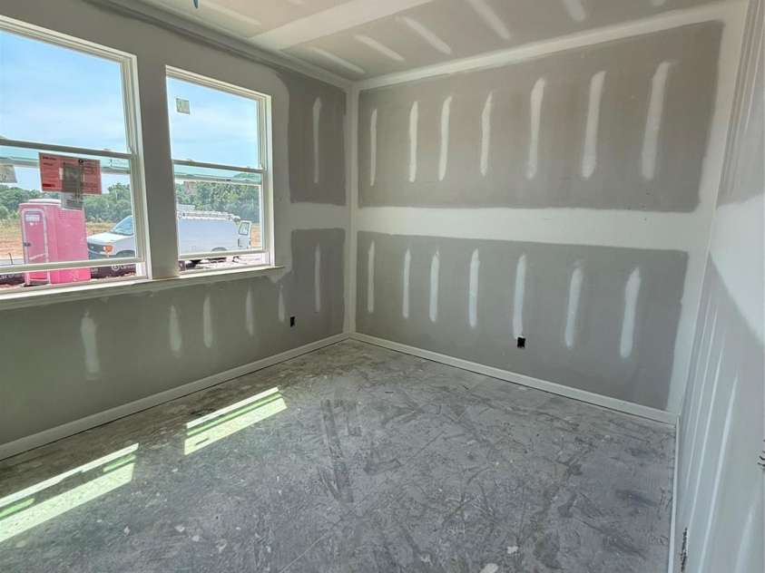 317 Maidstone Drive, Monroe, NC 28110.  MLS# CAR4237883, YatesRealty ID 15189. Main level bedroom