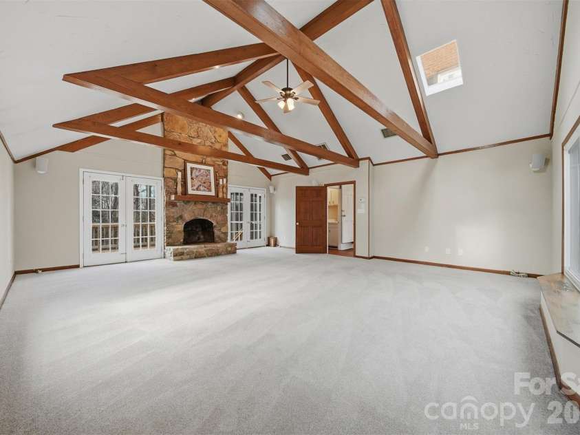 4041 4th Street Court, Hickory, NC 28601.  MLS# CAR4340977, YatesRealty ID 1519. Expansive Family Room with French Doors that open to the deck and screened in porch areas