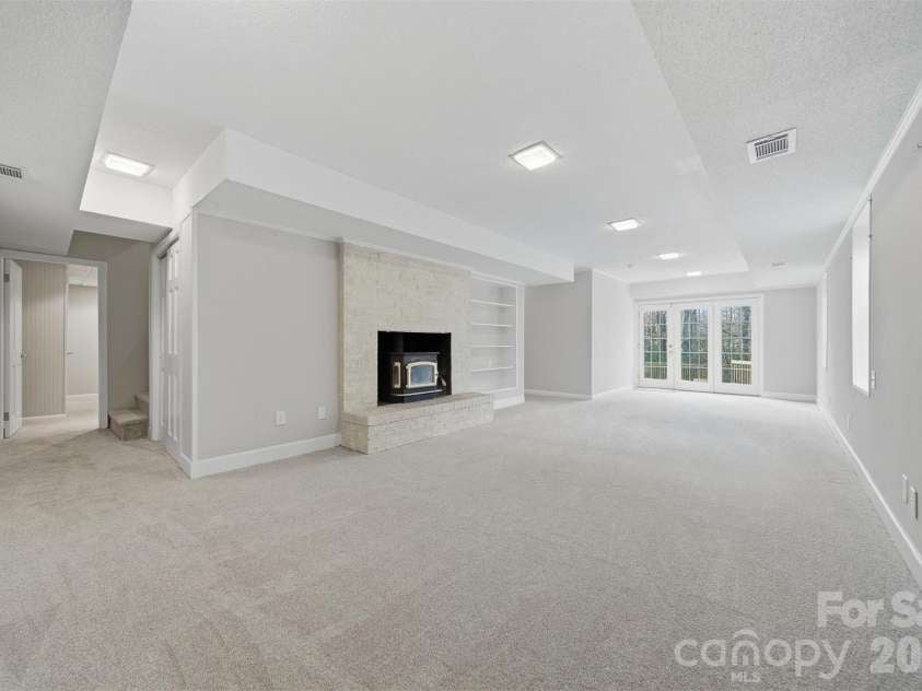 4041 4th Street Court, Hickory, NC 28601.  MLS# CAR4340977, YatesRealty ID 1519. Lower Level Rec Room with walk out to Back Yard and Pool Area