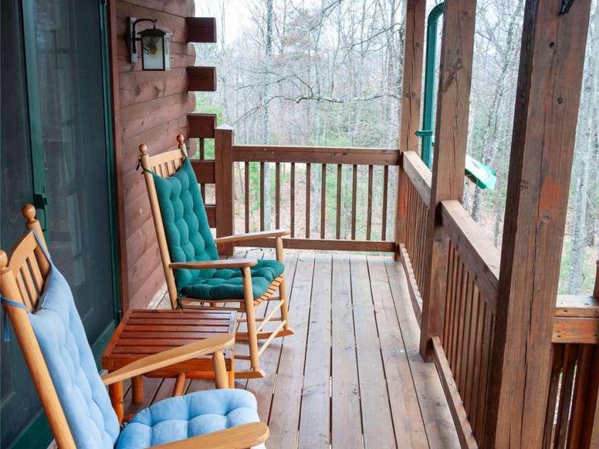 125 Turkey Ridge Trail, McGrady, NC 28649.  MLS# CAR4252396, YatesRealty ID 15196. Front Deck (partially covered)