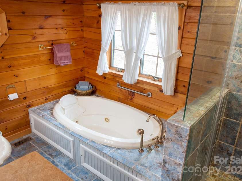 125 Turkey Ridge Trail, McGrady, NC 28649.  MLS# CAR4252396, YatesRealty ID 15196. Primary Bathroom