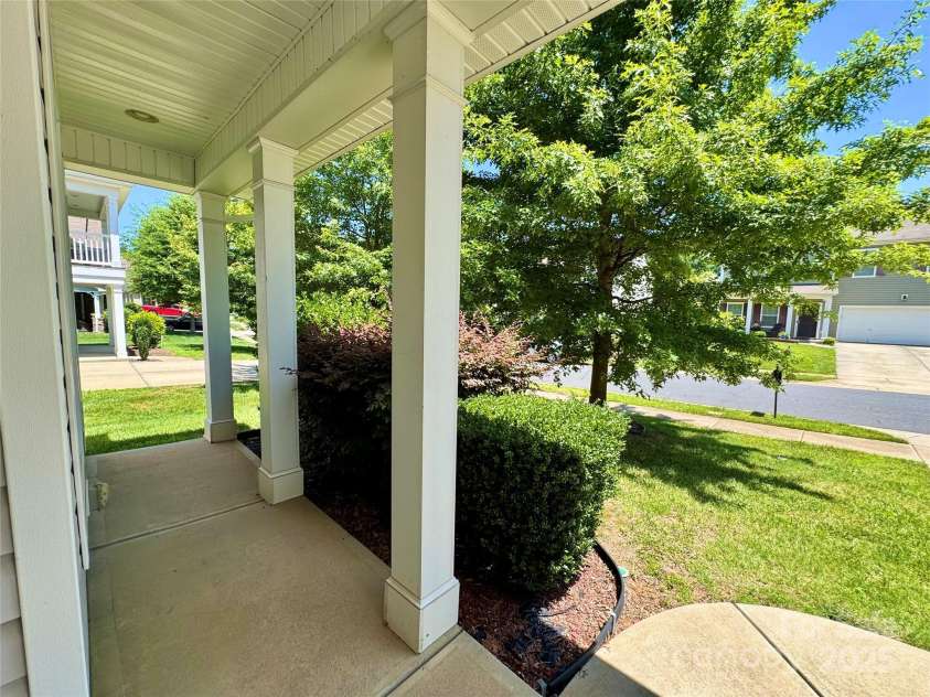 11109 Pond Valley Court, Charlotte, NC 28269.  MLS# CAR4273607, YatesRealty ID 15198. Enjoy coffee/tea on your covered front porch