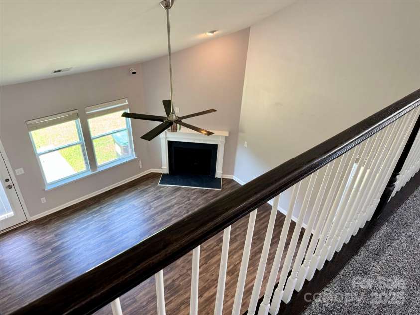 11109 Pond Valley Court, Charlotte, NC 28269.  MLS# CAR4273607, YatesRealty ID 15198. Loft overlooks living room