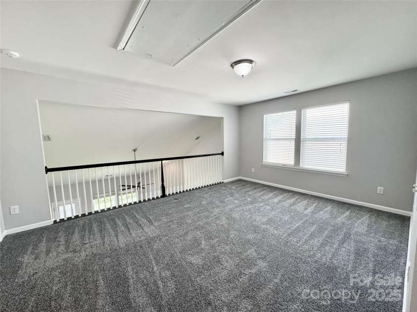 11109 Pond Valley Court, Charlotte, NC 28269.  MLS# CAR4273607, YatesRealty ID 15198. Spacious loft